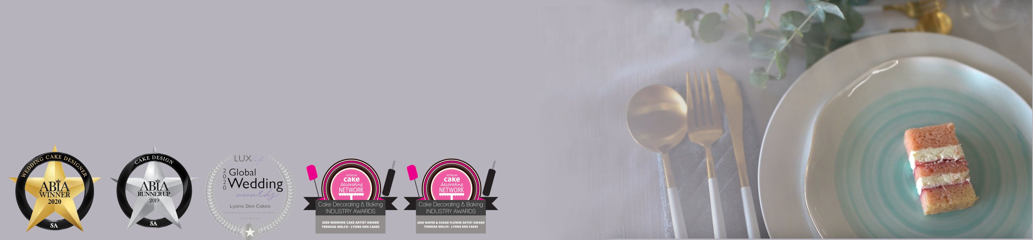 An ABIA award logo and a plated piece of cake with utensils